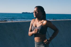 Woman running for a total body workout